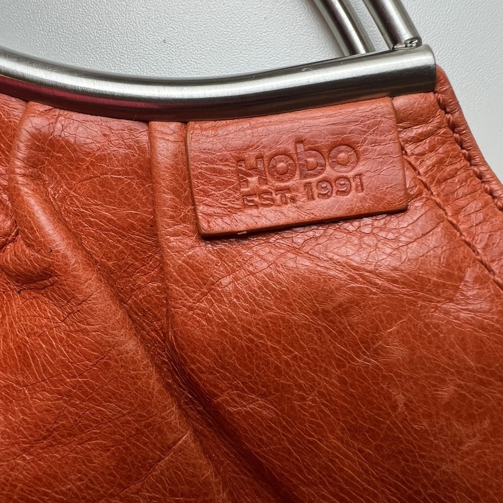 Hobo International Fold Over Clutch Pumpkin Orange Leather Handbag - Picture 3 of 11